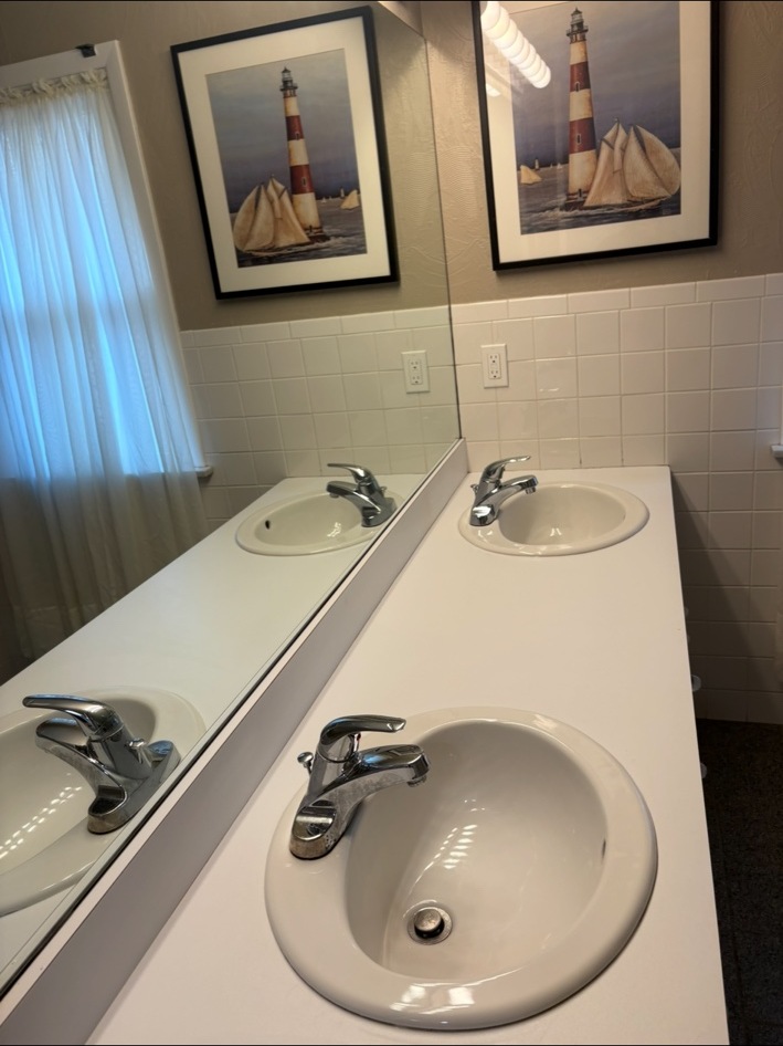 Fresh bathroom vanity clean by TidyMamas